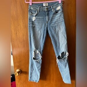 Agolde skinny jeans with distressing and rips at the knees. Good used condition.